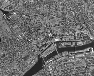 A black and white aerial photo of Lawrence, MA.